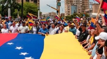 Imagem de Mais de 21 milhões de venezuelanos vão hoje às urnas (áudio)